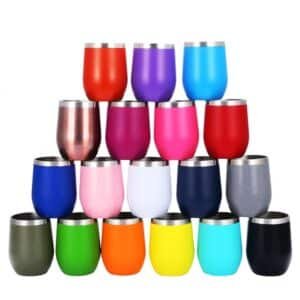 A pyramid of colorful 12oz wine tumbler vacuum insulated egg-shaped wine tumblers in 18+ different colors, showcasing mass customization and bulk supply capabilities.
