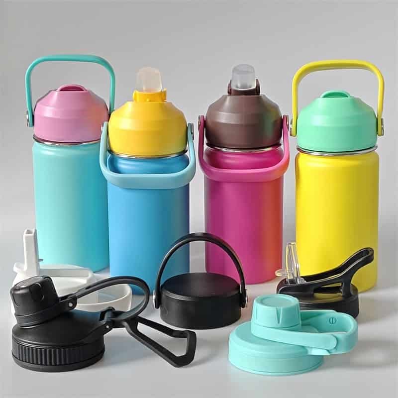 Detailed view of interchangeable caps for kids insulated water bottles showing food-grade silicone straws and heavy-duty carry handles.