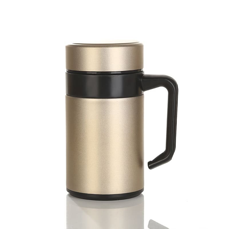 A champagne gold business thermal mug lying down with its fine-mesh stainless steel tea infuser snugly fitted into the top opening.