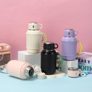 Close up of the grey anti-slip silicone base cushion on a purple one-touch spring vacuum flask showing embossed instructional icons.