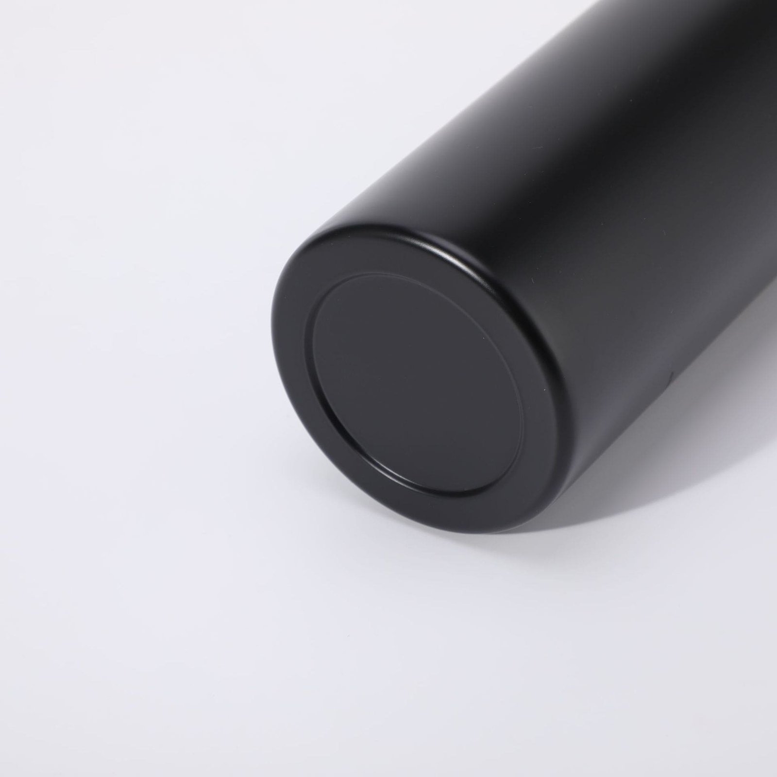 Stable smooth bottom structure of single wall stainless steel water bottle in premium matte black powder coating.