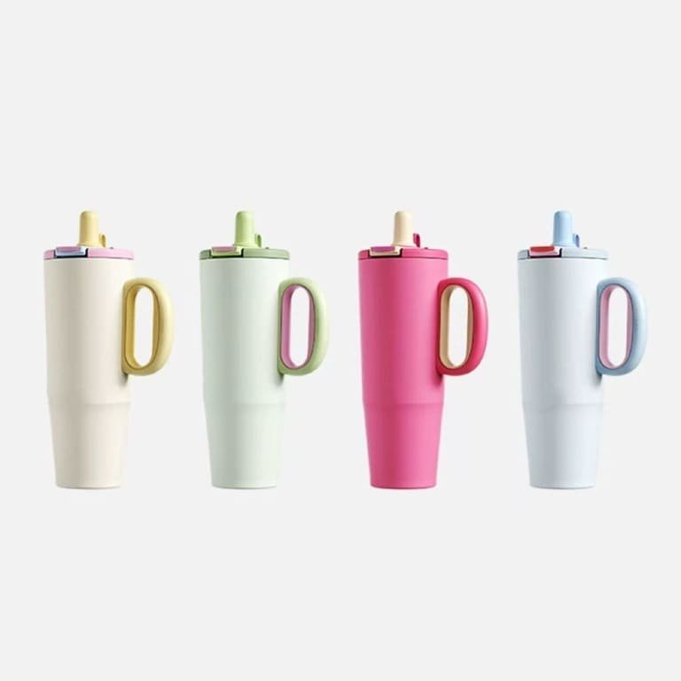 Four 1200ml 40oz stainless steel travel tumblers with dual-color handles displayed side-by-side in beige, green, pink, and light blue.