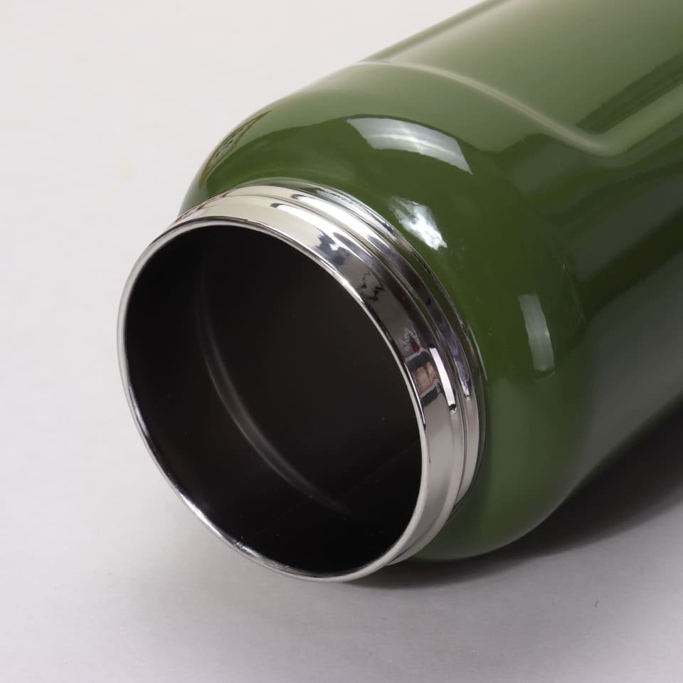 Oblique angle view of the open wide mouth double wall stainless steel flask rim showing high polish quality.