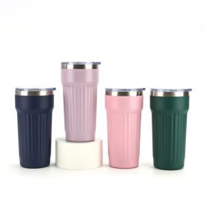 Wholesale 20oz Roman Column tumbler fluted geometry vacuum insulated mugs in four pastel colors arranged on marble risers.