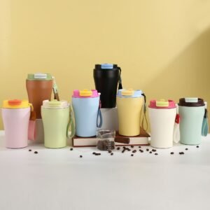 Bulk wholesale 380ml waisted stainless steel coffee mugs in various pastel and matte color options lined up with coffee beans.