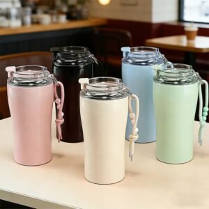 Five pastel 450ml slim stainless steel coffee tumblers with beaded lanyards displayed on a wooden table in a café.